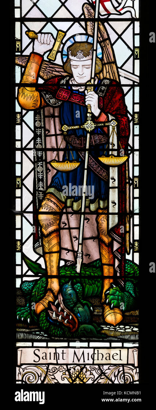 Saint Michael stained glass, St. Wilfrid`s Church, North Muskham, Nottinghamshire, England, UK Stock Photo